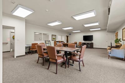 Bright common area with tables and seating
