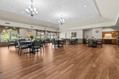 Bright dining area with tables and chairs
