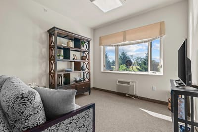 Bright interior living space with a view and furnishings