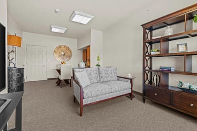Bright living area of a senior care facility room