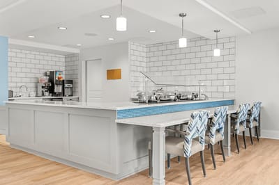 Bright, modern dining area with seating