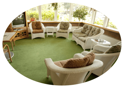 Comfortable seating area in a bright common room