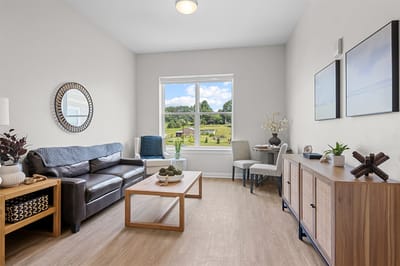 Bright interior common area with views of the outdoor space