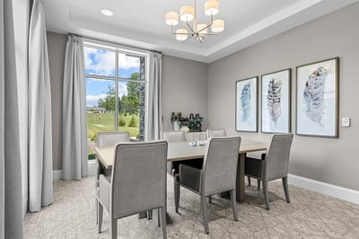 Bright common area with a large window and artwork