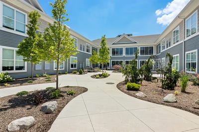 Outdoor courtyard with landscaped gardens and seating areas