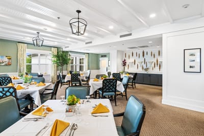 Dining room with tables set for a meal