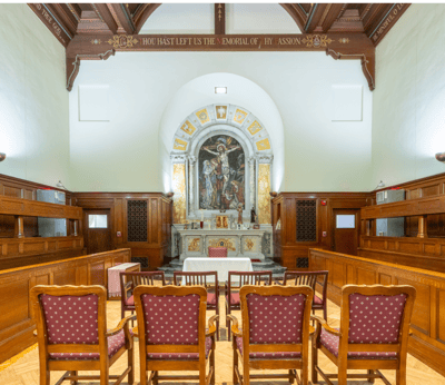 Interior view of a serene chapel with seating