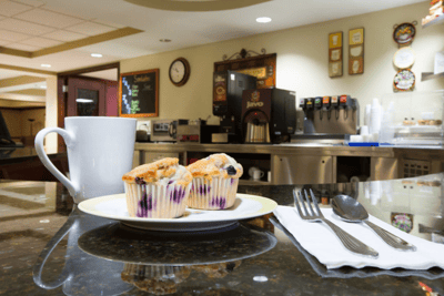 Fresh muffins and coffee in a cozy dining area