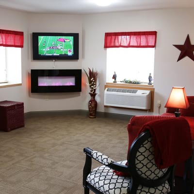 Cozy common area with seating and TV