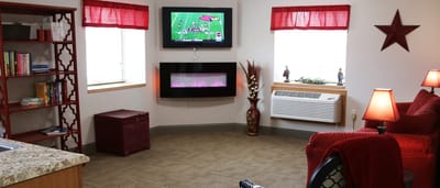 Cozy common area with a television and seating