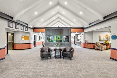Interior view of a bright common area with seating