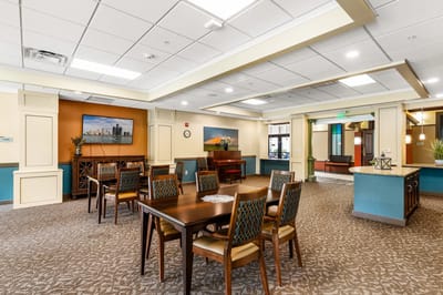 Interior view of a common area with dining tables