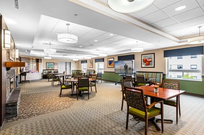 Bright common area with tables and chairs
