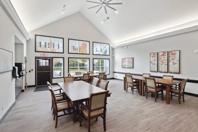 Bright common area with tables and chairs