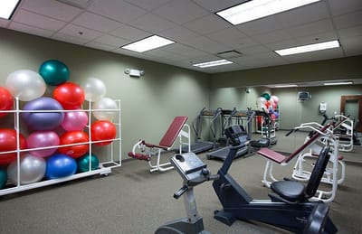 Interior view of a fitness area with exercise equipment