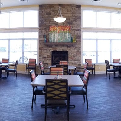 Interior view of a dining area with tables and chairs