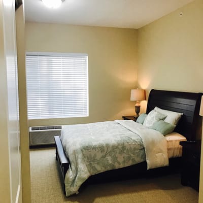 Cozy private room with a bed and window light