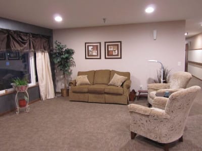 A cozy common area with seating and decor