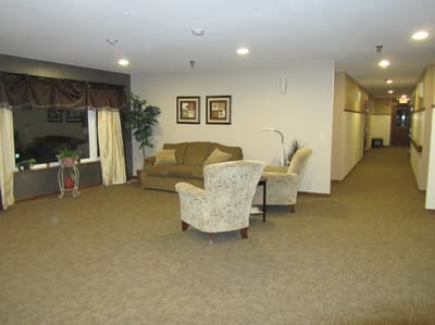 Common area with seating and decor in facility interior