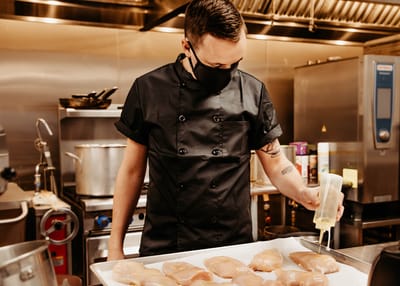 Chef preparing food in a commercial kitchen