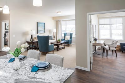 Bright living room and kitchenette in a resident apartment