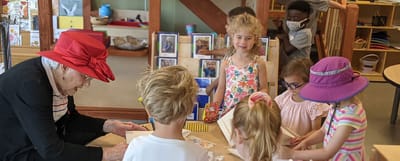 Residents engaging with children in an activity room