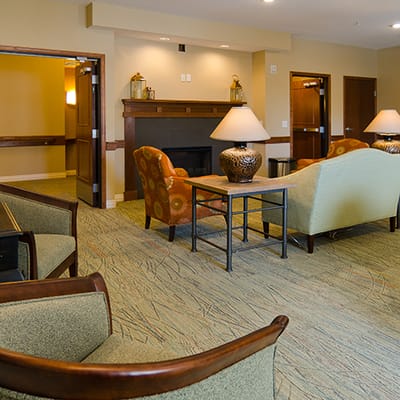 A cozy common area with seating and decor