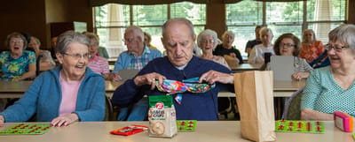 Residents participating in a lively bingo game