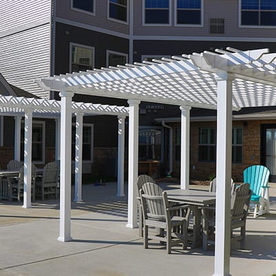 Outdoor seating area with pergolas and tables