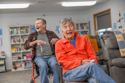 Residents enjoying a lively moment in a common area