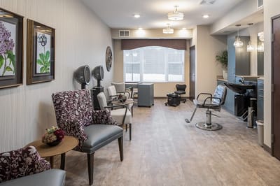 Beautician's salon area with seating and equipment
