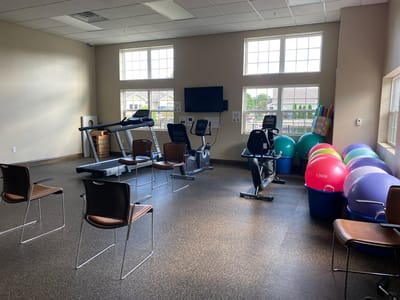 Interior view of a fitness area with exercise equipment