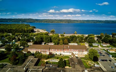 Aerial view of Elysian Senior Homes with a lakeside backdrop