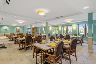 Dining area with tables set for meals