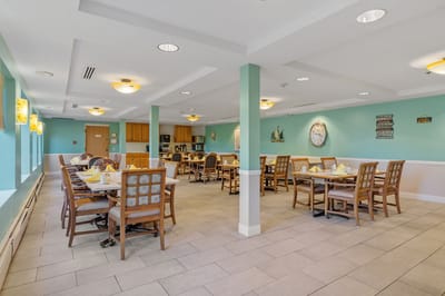 Dining area with tables set for a meal