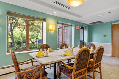 Dining area with tables set for a meal