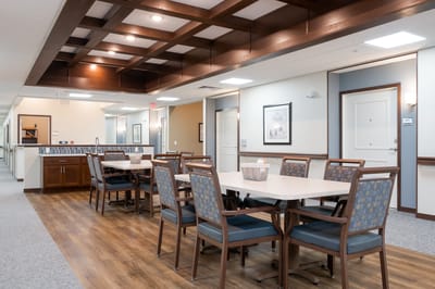 Interior view of a common area with seating and tables