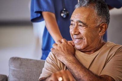 A caregiver providing comfort to a resident