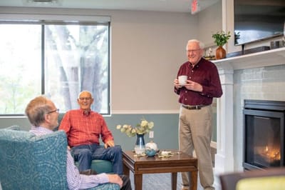 Residents socializing in a cozy common area
