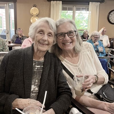 Residents smiling together in a common area
