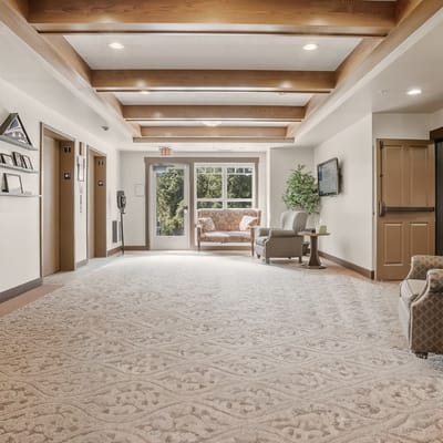 Interior view of a common area with seating and carpets