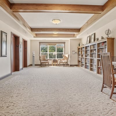 Spacious common area with shelves and seating