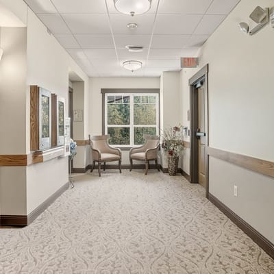 Interior hallway with seating and natural light