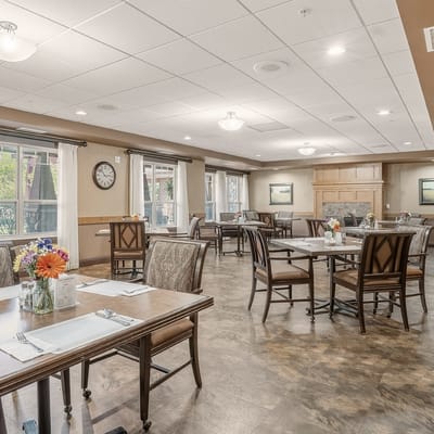 Bright dining area with tables set for meals