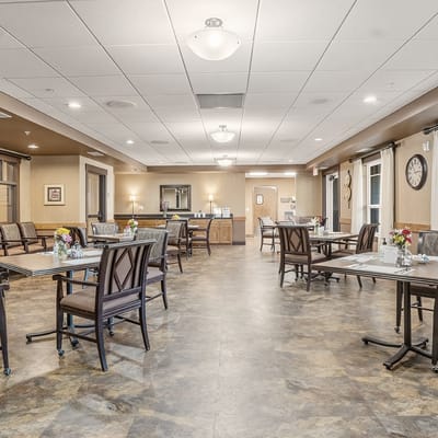 Dining room with tables set for meals