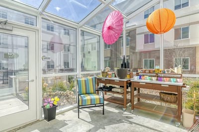 Bright indoor space with colorful decor and seating