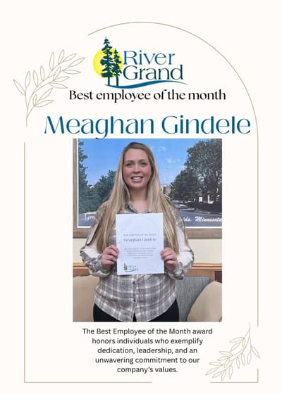 Employee of the month recognition with a smiling staff member