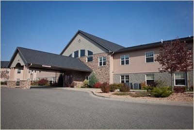 Exterior view of River Grand Senior Living facility