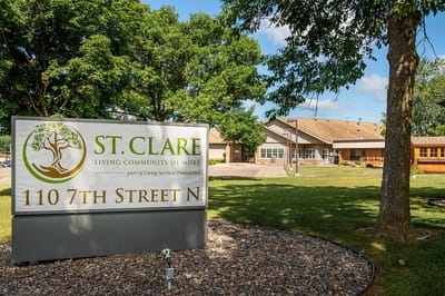 Exterior view of St. Clare Living Community sign and building