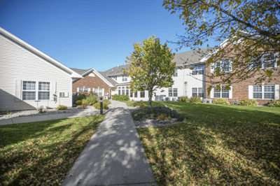 Pathway through outdoor space at a senior housing facility